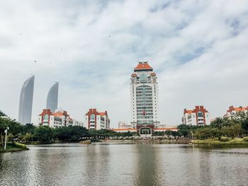 Modern buildings against sky in city