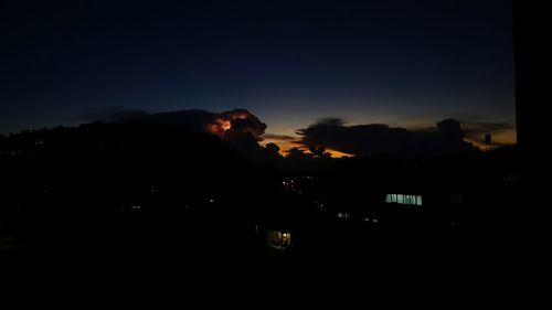 Silhouette of illuminated building at night