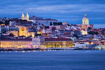 View of lisbon view over tagus river with yachts and boats in the evening. lisbon, portugal