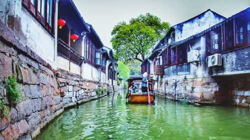 View of canal along buildings