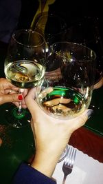 Close-up of woman drinking glass