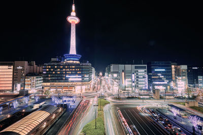 Illuminated buildings in city at night