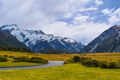 Scenic view of snowcapped mountains against sky