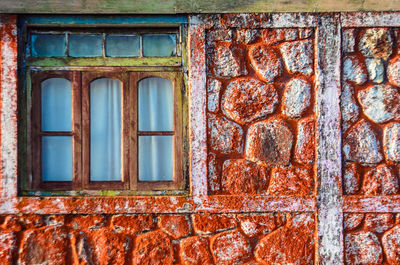 Full frame shot of window of old building