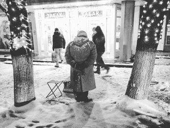 Rear view of a couple on the ground