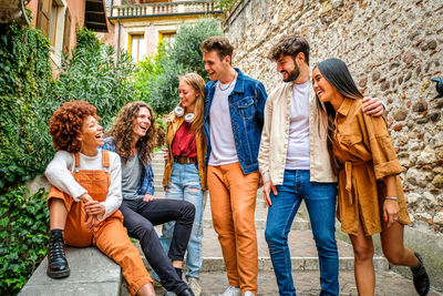 Group of friends standing on street