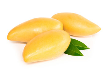 Close-up of oranges against white background