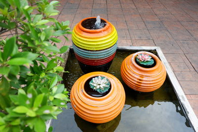 High angle view of urns in pond
