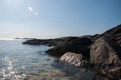 Scenic view of sea against clear sky