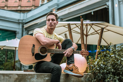 Young man playing guitar