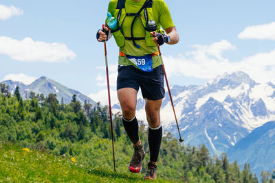 Full length of man standing on mountain