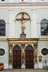 Jesus christ statue on wall at church