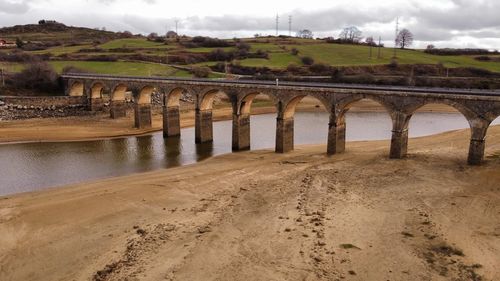 Arch bridge over river