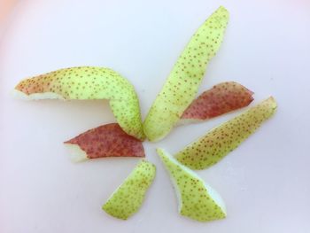 Close-up of fruits against white background