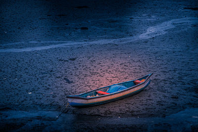 High angle view of boat moored on shore