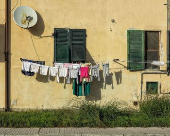 Clothes drying against building