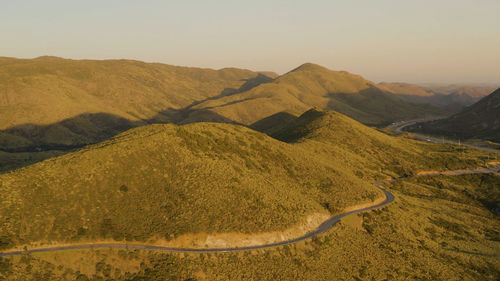 Scenic view of landscape against sky during sunset