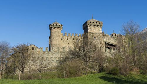 Fénis castle seen from the side aosta valley italy