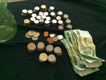 High angle view of coins on table