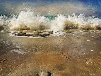 Sea waves splashing on shore