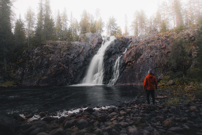Finland's famous hepokongas waterfall at sunrise and mist descending into the valley. tourist spot 