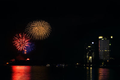 Firework display at night