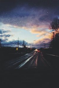 View of road against cloudy sky