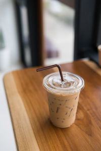 Close-up of coffee cup on table