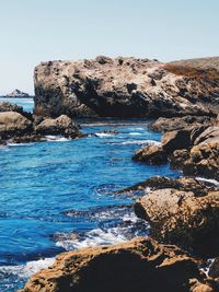 Scenic view of sea against clear sky