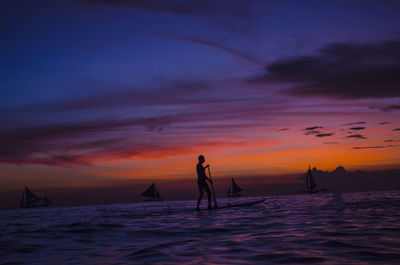 Scenic view of sea at sunset