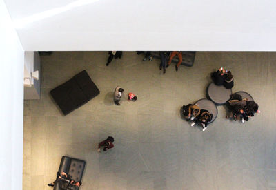 High angle view of people on table