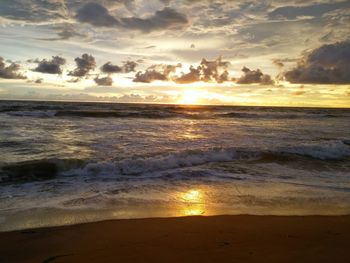 Dramatic sky over sea during sunset