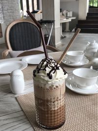 Close-up of coffee cup on table