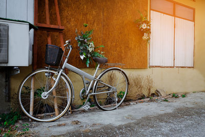 Bicycle parked outside house