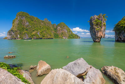 Scenic view of sea against blue sky