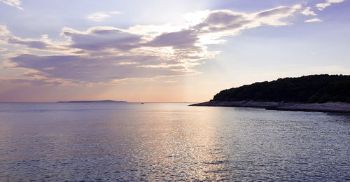 Sunset over the ocean at the island of losinj, croatia.