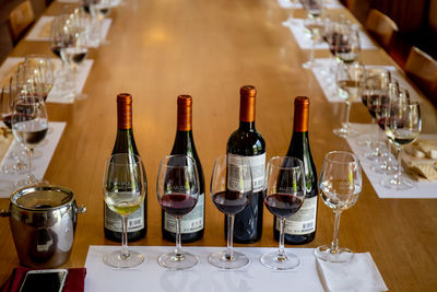 Wine bottles on table at restaurant