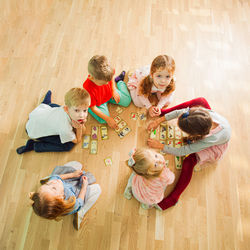 High angle view of people on wooden floor