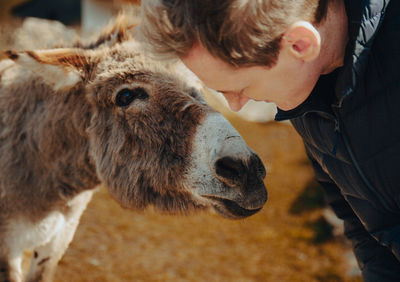 A man with a donkey