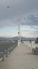 Road against cloudy sky
