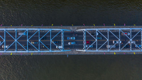 High angle view of cars on bridge over river