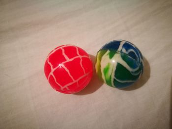 Close-up of multi colored candies on table