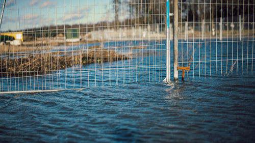 Flooded fence in construction site