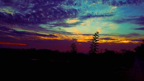 Scenic view of silhouette landscape against sky during sunset