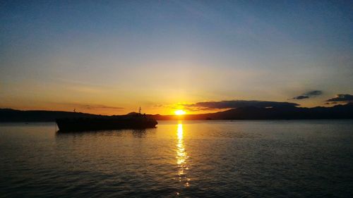 Scenic view of sunset over sea