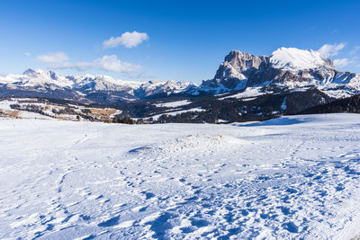 Scenic view of snowcapped mountains against sky