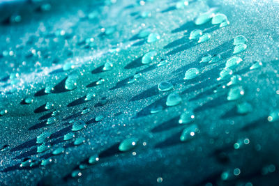 Close-up of water drops on glass