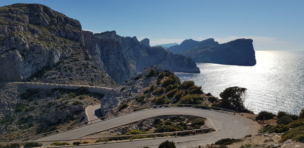 High angle view of road by sea against sky