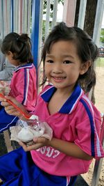 Portrait of cute girl smiling