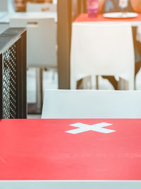 Close-up of empty seats on table in restaurant